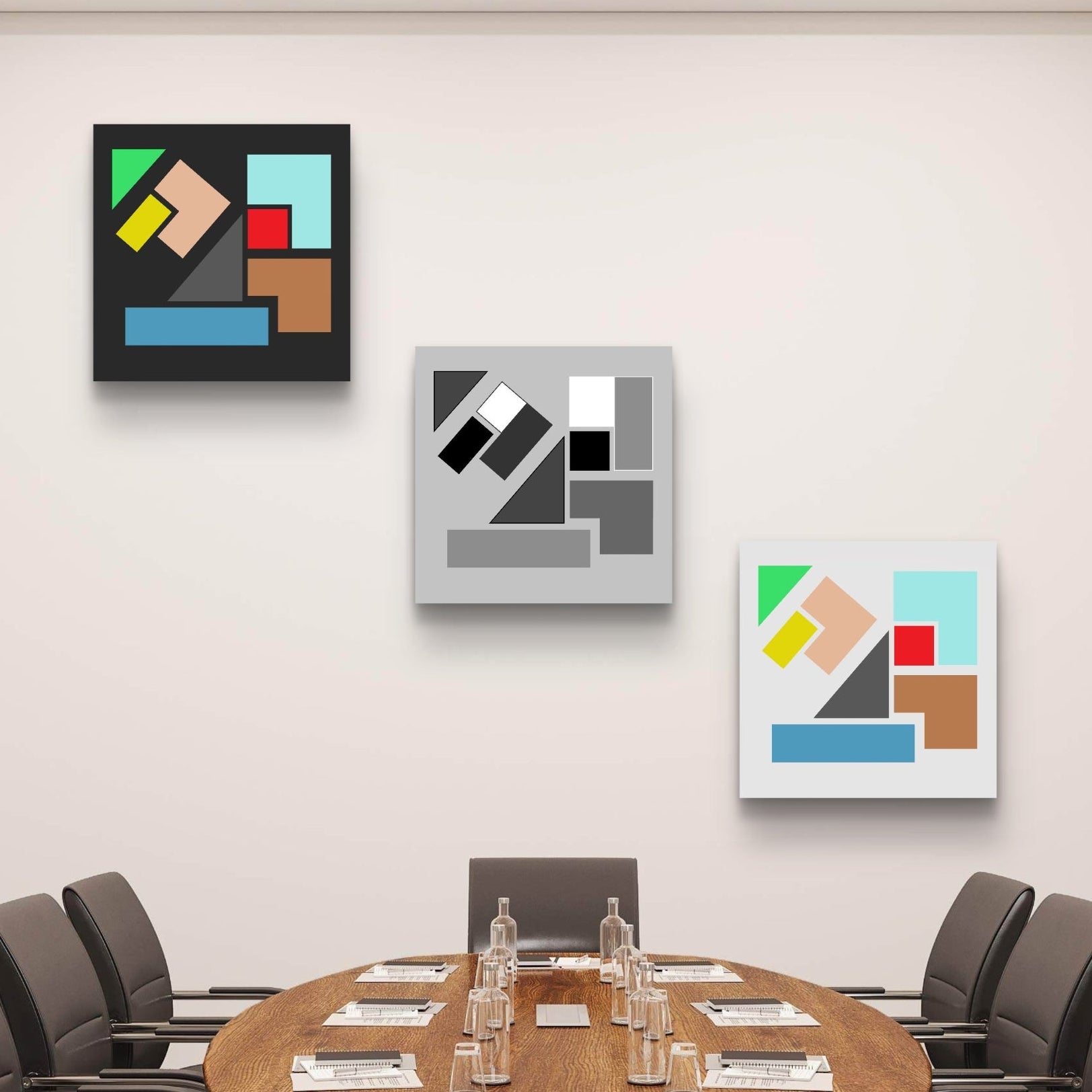 Modern meeting room with an oval table and chairs, featuring a diagonal collage of 3 curated abstract geometric artworks.