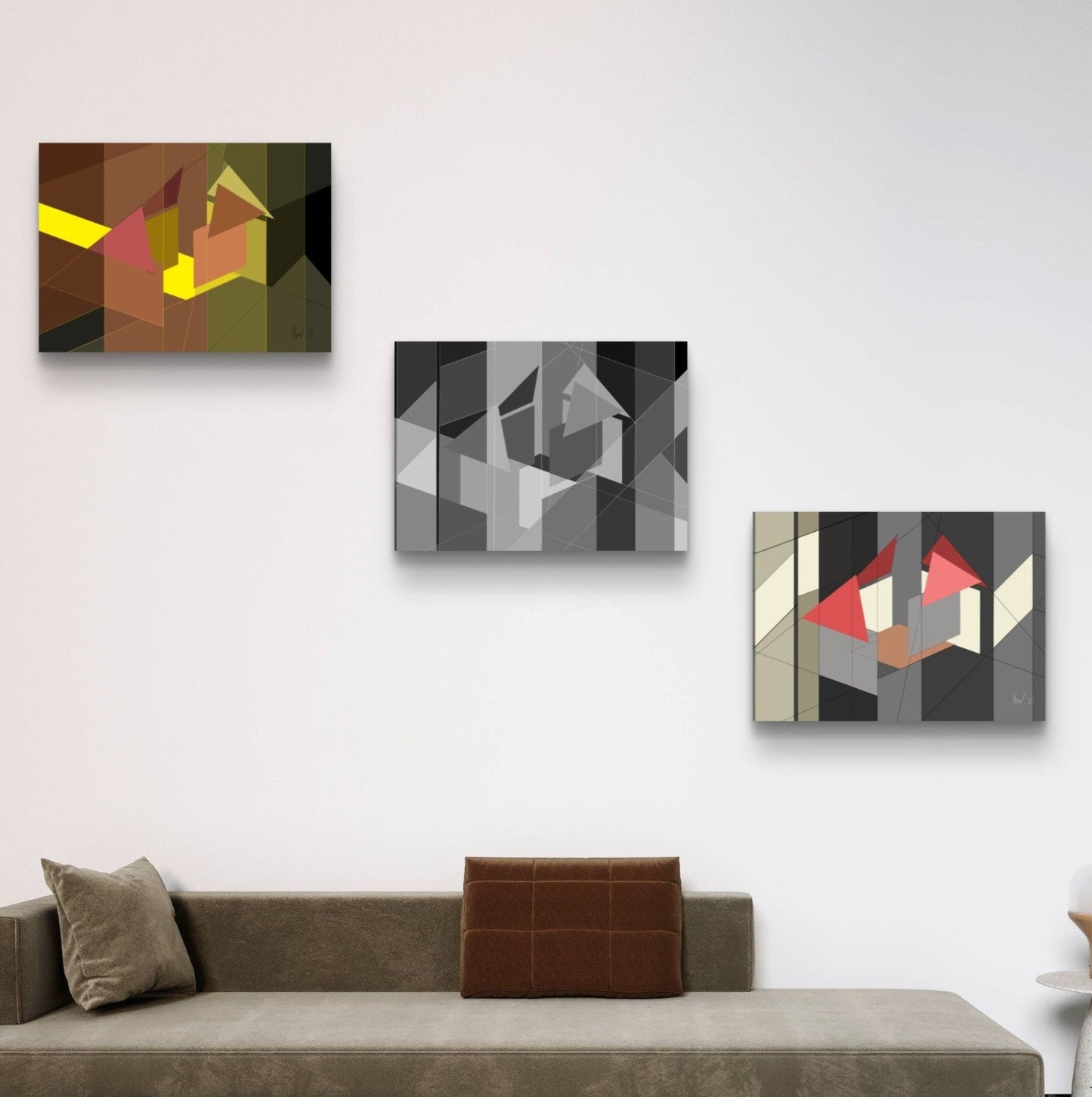 A gallery wall of abstracts in a diagonal array with a brown sofa below them