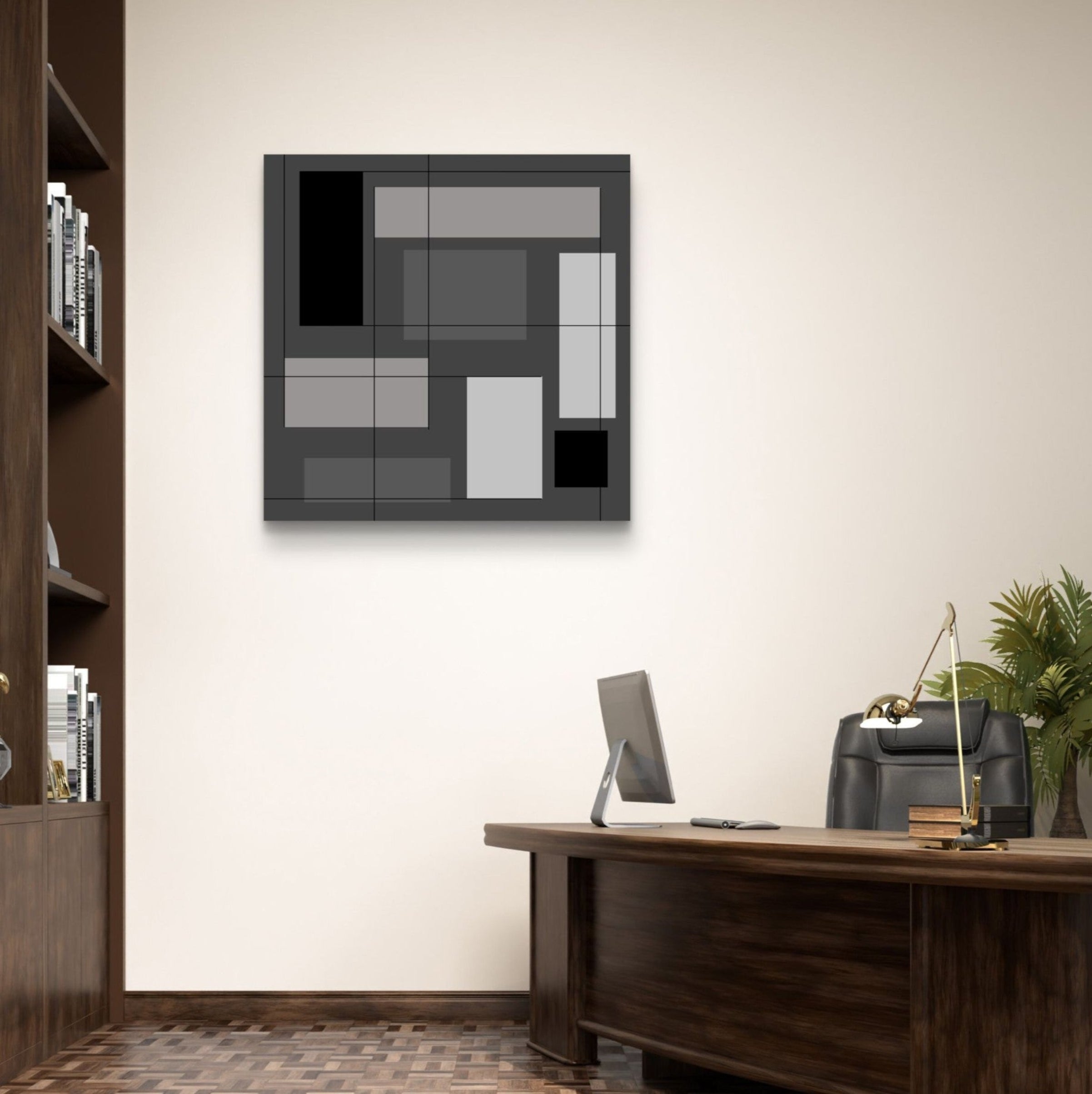 Modern office interior with a geometric wall art piece, desk, and bookshelf.